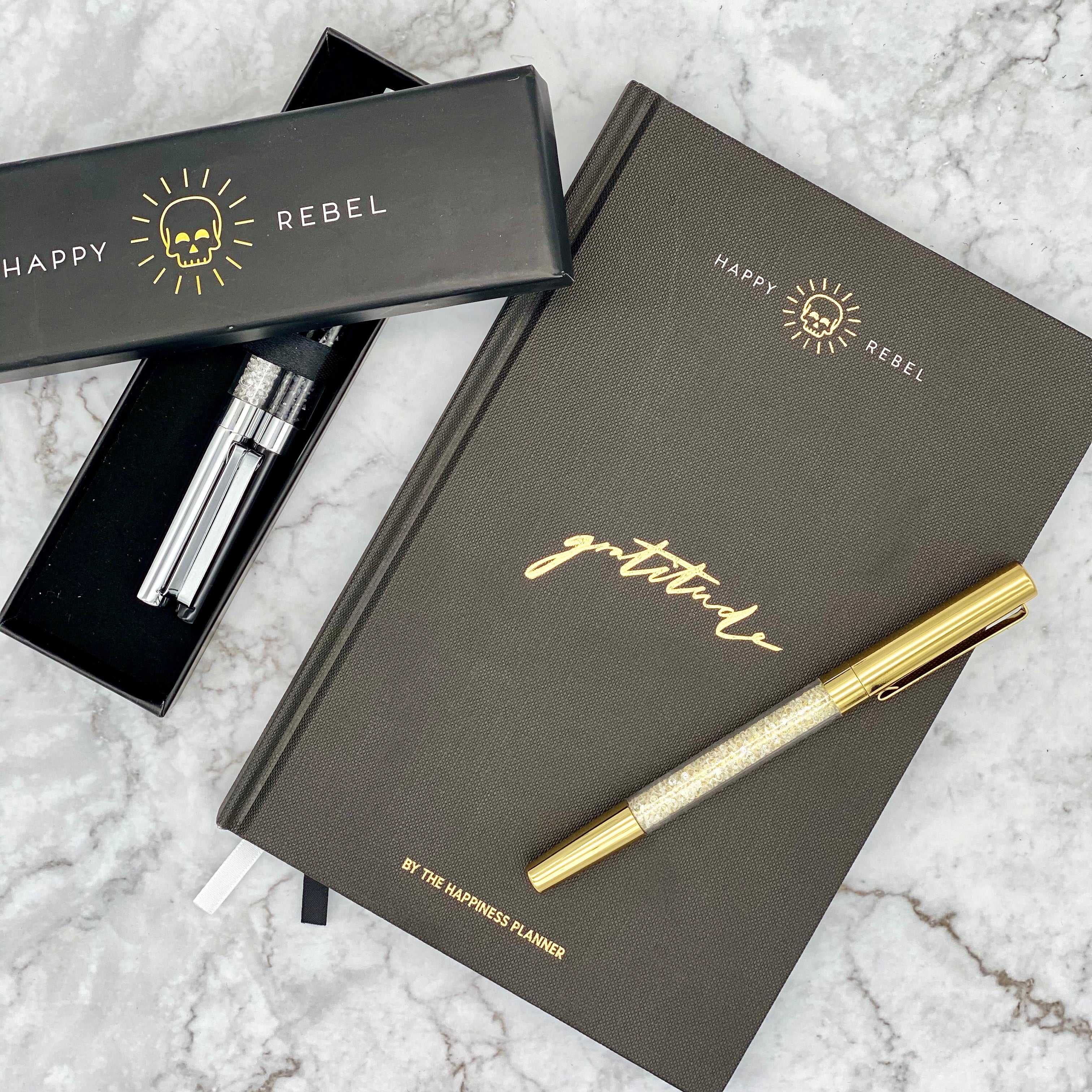 a gratitude journal and pen set from Happy Rebel