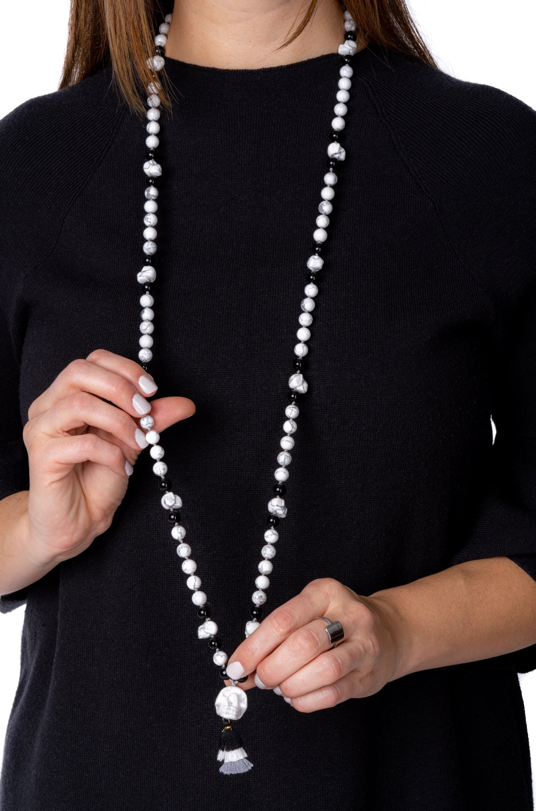 Howlite and Obsidian Mala Necklace on Woman