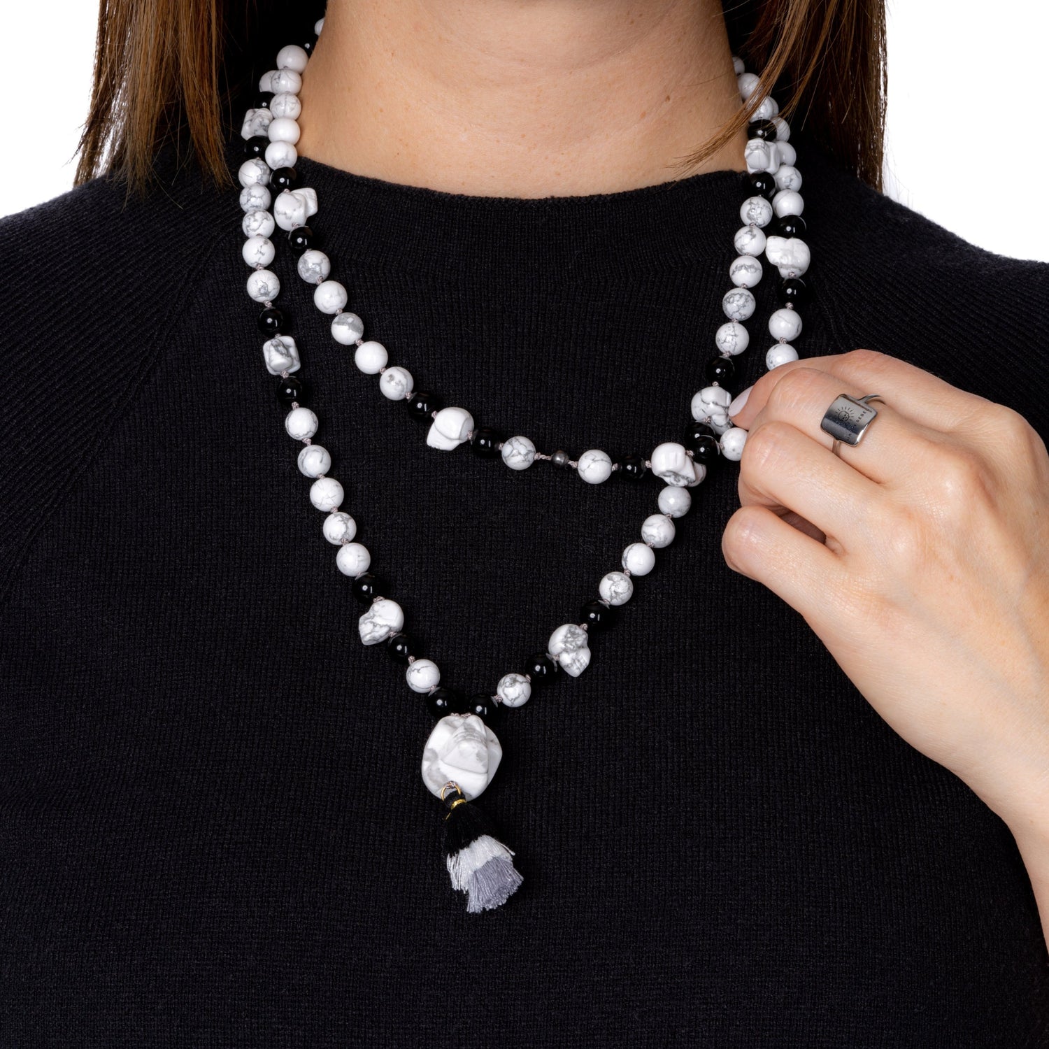 Howlite and Obsidian Mala Necklace on Woman