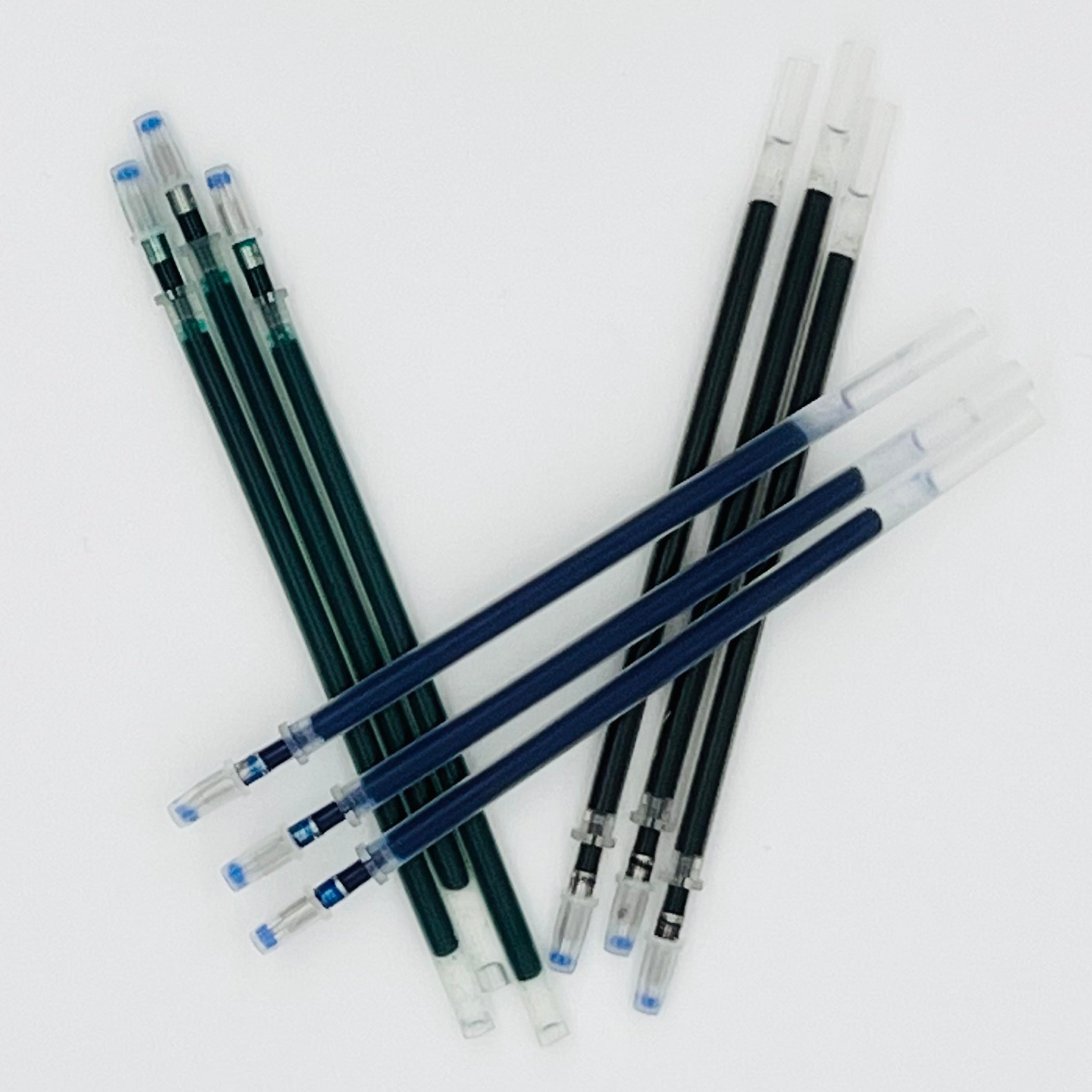 Green, blue, and black ink refills
