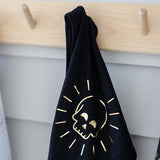Gold skull on the back of happy rebel tank top